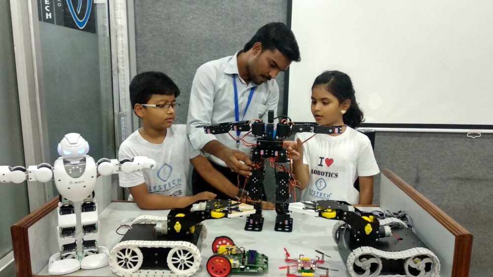 Child building a robotics kit